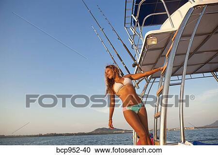 woman on ladder of yacht View Large Photo Image Stock Image - woman on ladder of yacht. Fotosearch