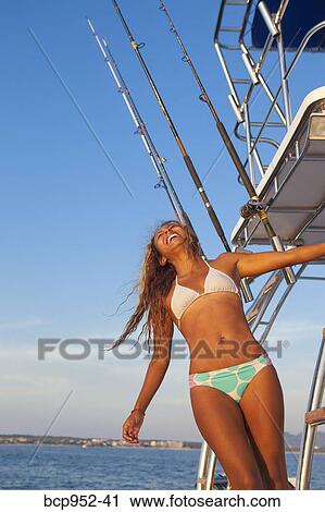 woman on ladder of yacht View Large Photo Image Stock Image - woman on ladder of yacht. Fotosearch