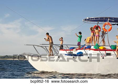 young people partying on yacht View Large Photo Image Stock Photograph - young people partying on yacht. Fotosearch