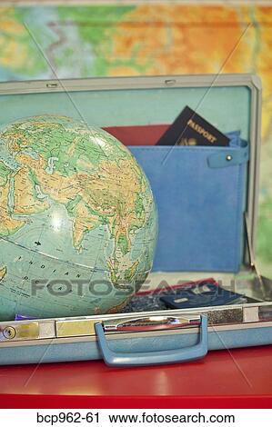 Globe sitting inside open vintage briefcase View Large Photo Image Stock Image - Globe sitting inside open vintage briefcase. Fotosearch