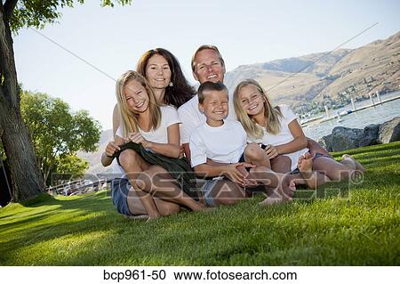 Stock Image - Outdoor portrait of family of five. Fotosearch