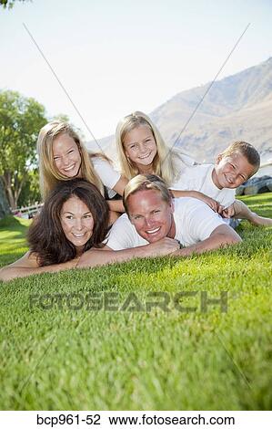 Stock Image - Outdoor portrait of family of five. Fotosearch