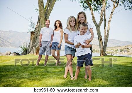 Outdoor portrait of family of five View Large Photo Image Stock Image - Outdoor portrait of family of five. Fotosearch