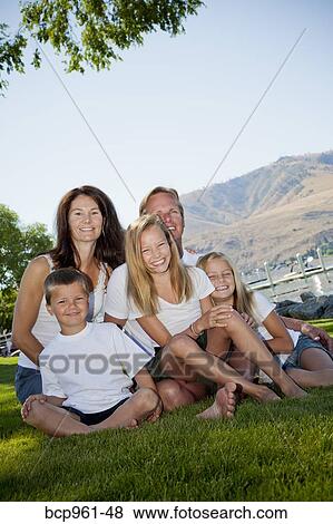 Outdoor portrait of family of five View Large Photo Image Stock Photo - Outdoor portrait of family of five. Fotosearch