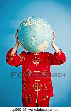 Woman in Chinese pajamas holding globe View Large Photo Image Stock Photography - Woman in Chinese pajamas holding globe. Fotosearch