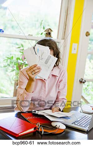 Woman paying bills View Large Photo Image Stock Image - Woman paying bills. Fotosearch