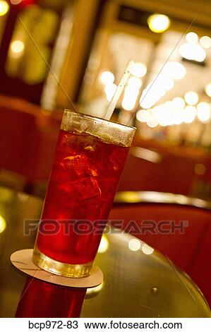 Colorful drink on table in restaurant View Large Photo Image Stock Image - Colorful drink on table in restaurant. Fotosearch