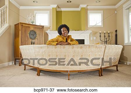 Elegant woman in formal living room View Large Photo Image Stock Photo - Elegant woman in formal living room. Fotosearch