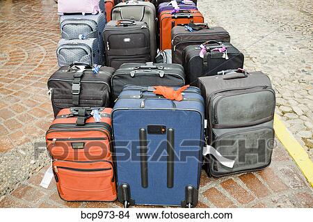 Large group of luggage on sidewalk View Large Photo Image Picture - Large group of luggage on sidewalk. Fotosearch