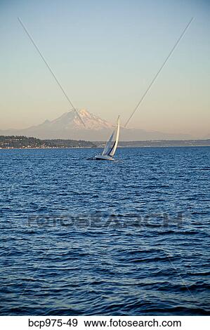Mt. Rainier behind sail boat on Puget Sound View Large Photo Image Stock Photo - Mt. Rainier behind sail boat on Puget Sound . Fotosearch