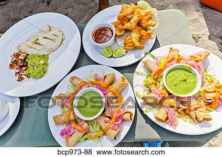 Plates of mexican food View Large Photo Image Stock Photo - Plates of mexican food. Fotosearch