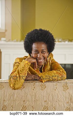 Portrait of elegant woman in gold jacket View Large Photo Image Stock Photo - Portrait of elegant woman in gold jacket. Fotosearch