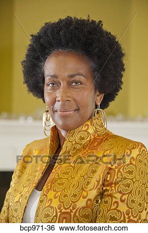 Portrait of elegant woman in gold jacket View Large Photo Image Stock Photograph - Portrait of elegant woman in gold jacket. Fotosearch