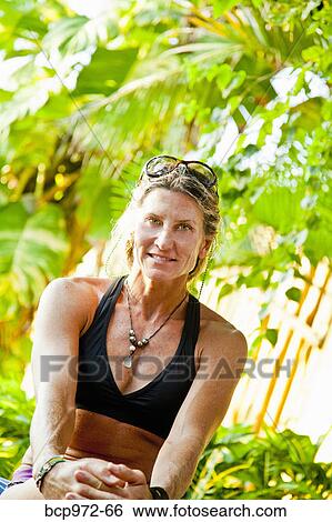 Portrait of woman in tropical location View Large Photo Image Stock Photograph - Portrait of woman in tropical location. Fotosearch