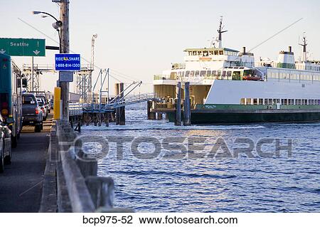 Stock Image - Puget sound ferry approaching dock. Fotosearch