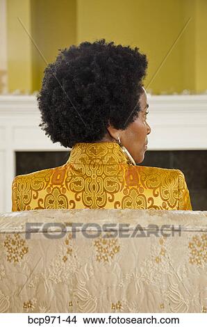 Rear view of woman with natural hairdo View Large Photo Image Picture - Rear view of woman with natural hairdo. Fotosearch