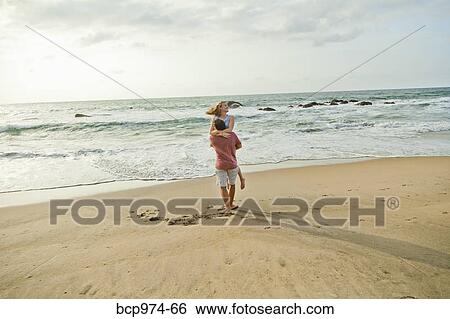Romantic young couple on beach View Large Photo Image Stock Photograph - Romantic young couple on beach. Fotosearch