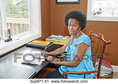 Woman in front door with shopping bags View Large Photo Image Stock Image - Woman in front door with shopping bags. Fotosearch