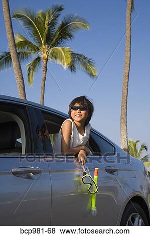 Boy Holding A Scuba Mask And Snorkel Leans Out Car Window Pictures Boy Holding A Scuba Mask And Snorkel Leans Out Car Window