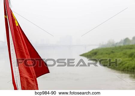 "Chinese flag on the stern of a riverboat, Leshan, Sichuan province, China" View Large Photo Image Stock Image - "Chinese flag on the stern of a riverboat, Leshan, Sichuan province, China". Fotosearch
