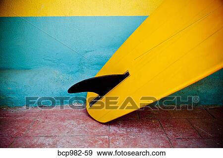 "Close up of a yellow, single fin, vintage surfboard" View Large Photo Image Stock Photo - "Close up of a yellow, single fin, vintage surfboard". Fotosearch