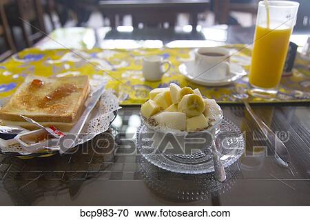 Fresh hotel breakfast on a sunny table View Large Photo Image Stock Image - Fresh hotel breakfast on a sunny table. Fotosearch