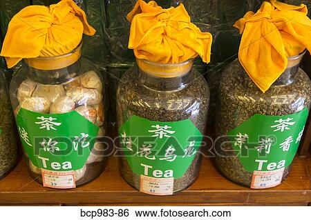 Jars of loose tea leaves in a tea shop View Large Photo Image Stock Photograph - Jars of loose tea leaves in a tea shop. Fotosearch
