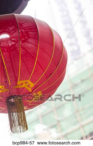 "New building construction seen behind a red temple lantern, Chongqing, China" View Large Photo Image Stock Photo - "New building construction seen behind a red temple lantern, Chongqing, China". Fotosearch