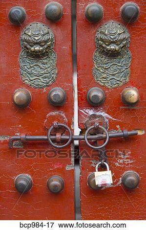 Stock Photo - "Padlocked doors to the Forbidden City, Beijing, China". Fotosearch