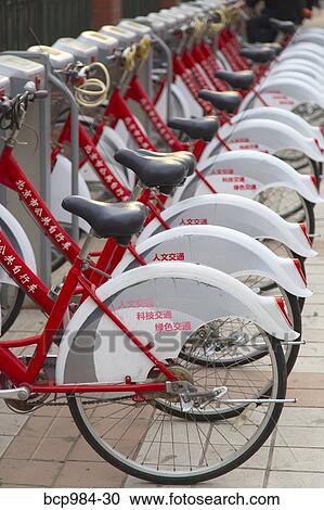 "Row of rental bicycles in central Beijing, China" View Large Photo Image Stock Image - "Row of rental bicycles in central Beijing, China". Fotosearch