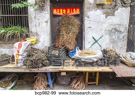 "Small shop selling vegetables in Chongqing Alley, China" View Large Photo Image Stock Photo - "Small shop selling vegetables in Chongqing Alley, China". Fotosearch