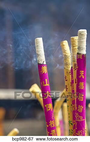 Stock Photo - "Temple incense burning at the monastery in Leshan, Chengdu". Fotosearch