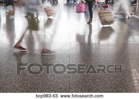 Stock Image - "Travelers in the Chongqing airport, Chongqing, China". Fotosearch