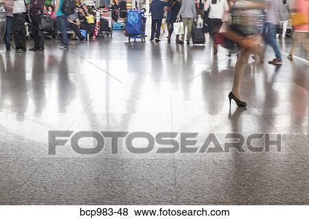 Stock Photo - "Travelers in the Chongqing airport, Chongqing, China". Fotosearch