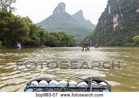 "View from a bamboo raft on the Li River, Yangshuo, China" View Large Photo Image Stock Photo - "View from a bamboo raft on the Li River, Yangshuo, China". Fotosearch