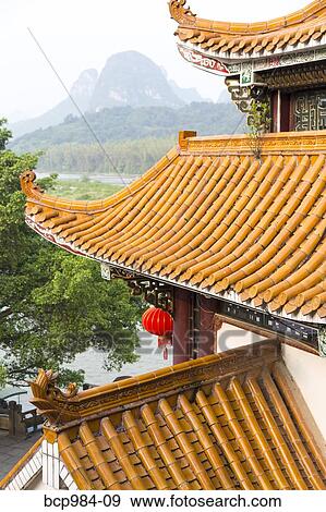 "View of Li River from a temple rooftop, Yangshuo, China" View Large Photo Image Stock Photo - "View of Li River from a temple rooftop, Yangshuo, China". Fotosearch