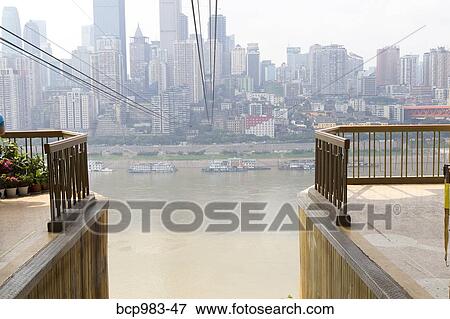 "View of the city from a cable car platform, Chongqing, China" View Large Photo Image Stock Photo - "View of the city from a cable car platform, Chongqing, China". Fotosearch