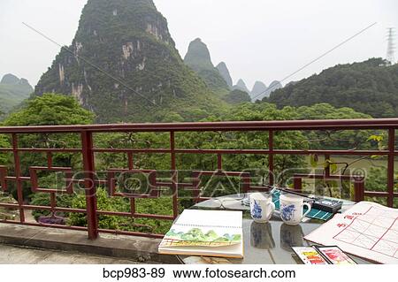 "Watercolor materials on a patio overlooking the Karst mountains, Yangshuo, China" View Large Photo Image Stock Photo - "Watercolor materials on a patio overlooking the Karst mountains, Yangshuo, China". Fotosearch