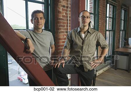 Man leaning in an office doorway. View Large Photo Image Stock Image - Man leaning in an office doorway.. Fotosearch