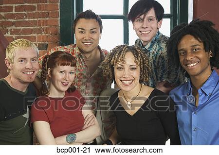 Six young colleagues in a loft-style office. View Large Photo Image Stock Image - Six young colleagues in a loft-style office.. Fotosearch