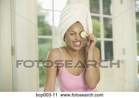 A young woman in spa setting. View Large Photo Image Stock Image - A young woman in spa setting.. Fotosearch