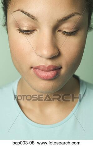 Close-up portrait of a young woman. View Large Photo Image Stock Photo - Close-up portrait of a young woman.. Fotosearch