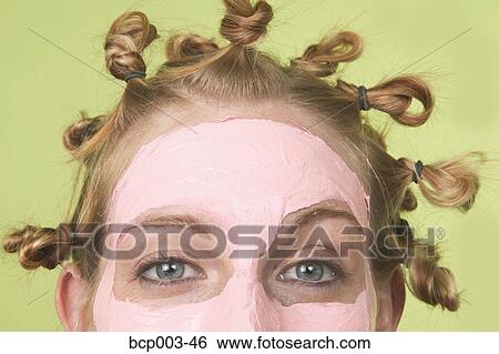 Upper half of a woman's face, with pale facial mask on. View Large Photo Image Stock Photograph - Upper half of a woman's face, with pale facial mask on.. Fotosearch
