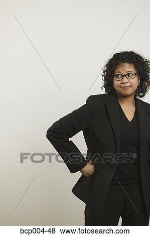 A young woman dressed for business. View Large Photo Image Stock Photo - A young woman dressed for business.. Fotosearch