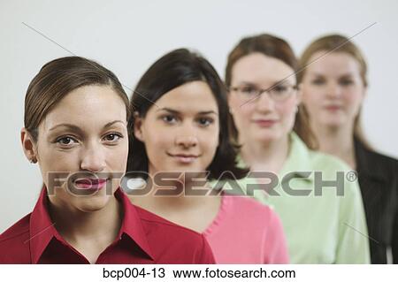 Four young businesswomen. View Large Photo Image Stock Image - Four young businesswomen. . Fotosearch