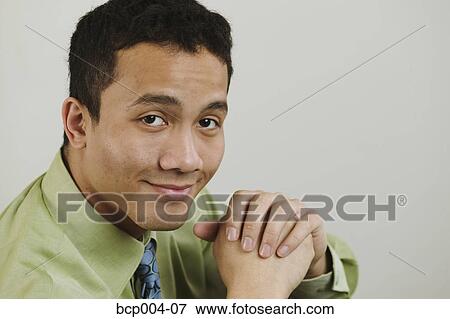 Studio portrait of a young businessman. View Large Photo Image Stock Photo - Studio portrait of a young businessman.. Fotosearch