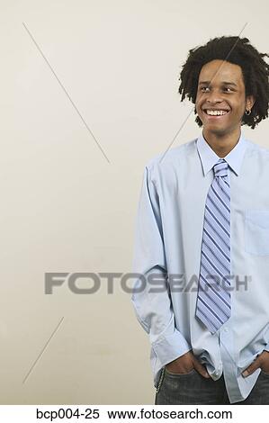 Studio portrait of a young man with dreadlocks. View Large Photo Image Stock Photography - Studio portrait of a young man with dreadlocks. . Fotosearch