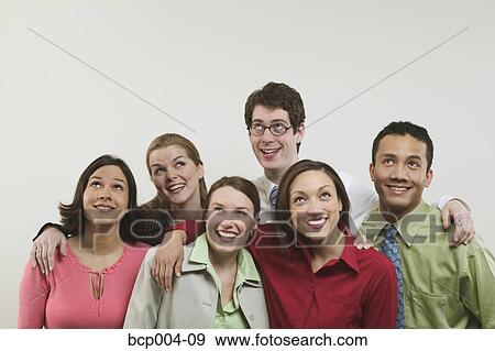 Studio portrait of six multi-ethnic work colleagues in casual business dress. View Large Photo Image Stock Photo - Studio portrait of six multi-ethnic work colleagues in casual business dress.. Fotosearch
