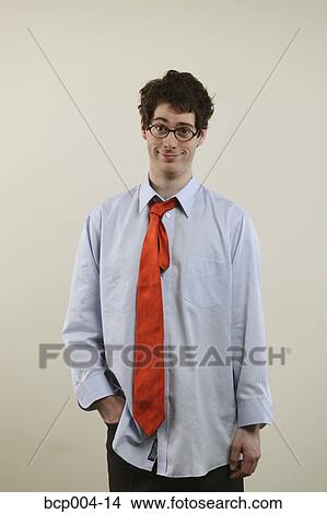 Young business guy looking silly. View Large Photo Image Picture - Young business guy looking silly.. Fotosearch