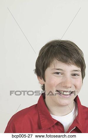 A smiling teenage boy. View Large Photo Image Stock Photo - A smiling teenage boy. . Fotosearch